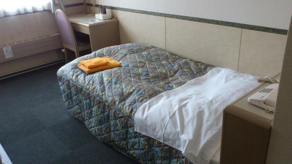 Business Hotel Motonakano Tomakomai Habitación foto